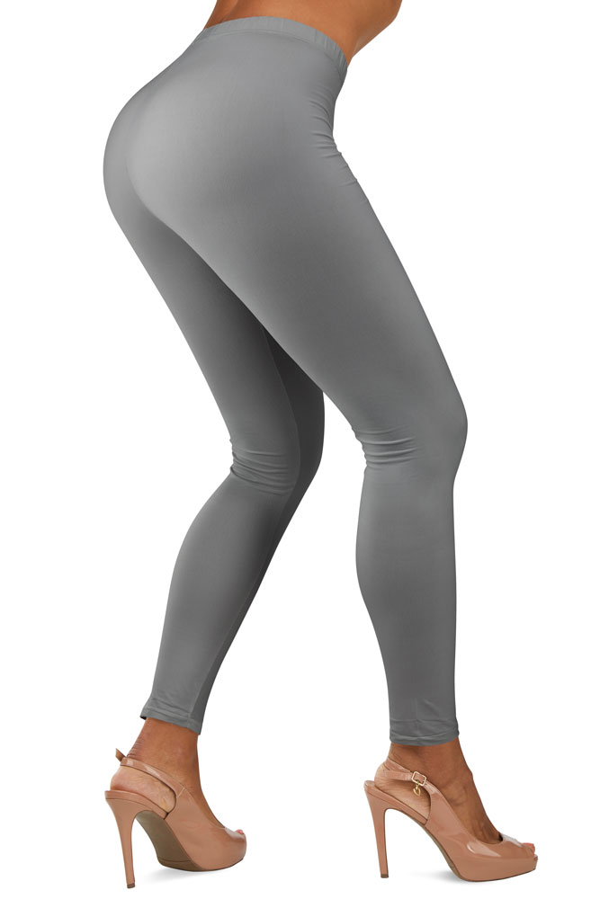Grey leggings photoshoot with a model on a white background