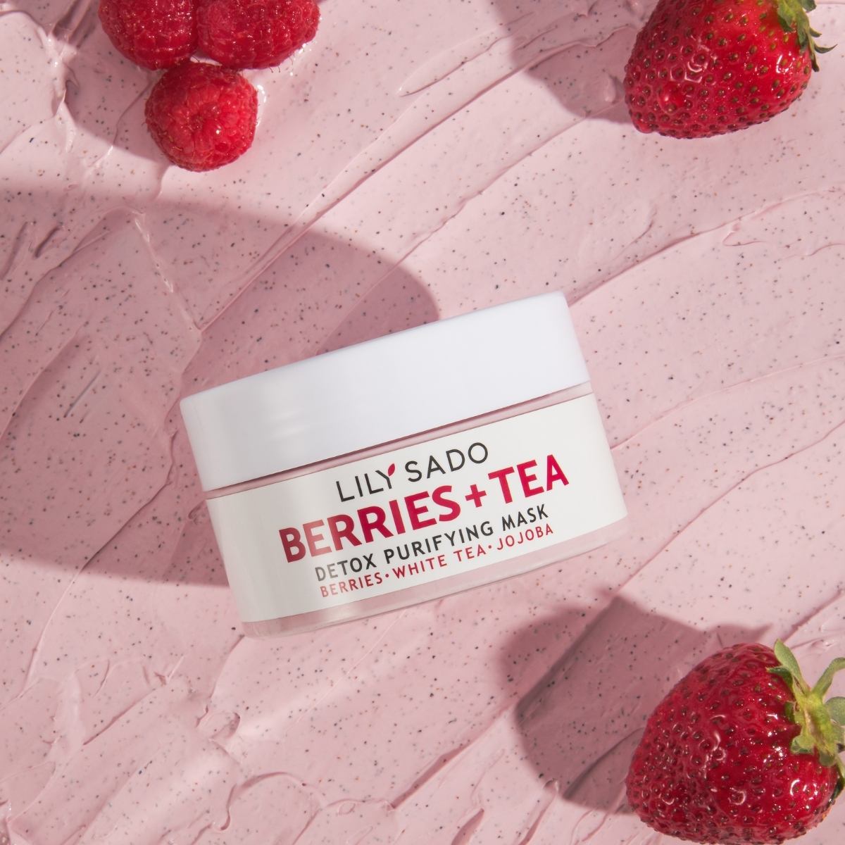creative beauty product image with swatch fruit on a pink