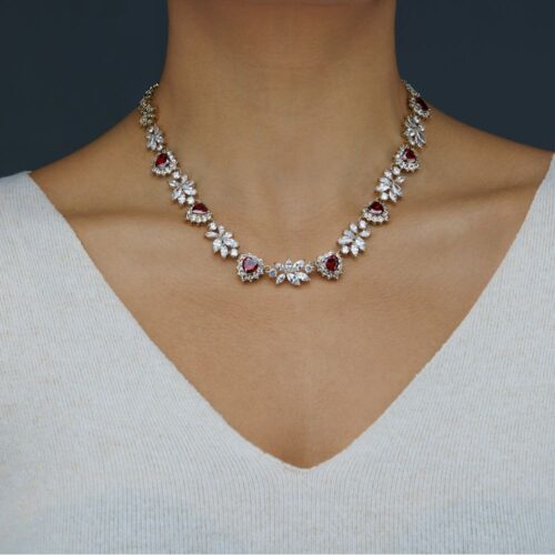 Necklace Photoshoot on a model on a grey background for eCommerce listing