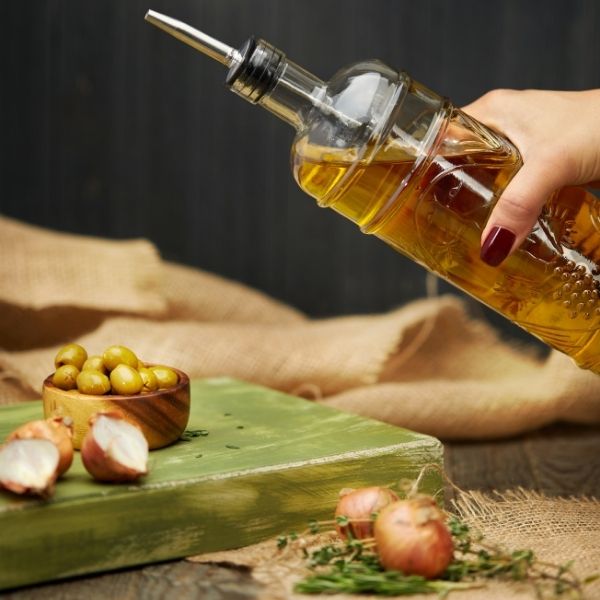Glass bottles photoshoot with props at Isa Aydin Photography Studio