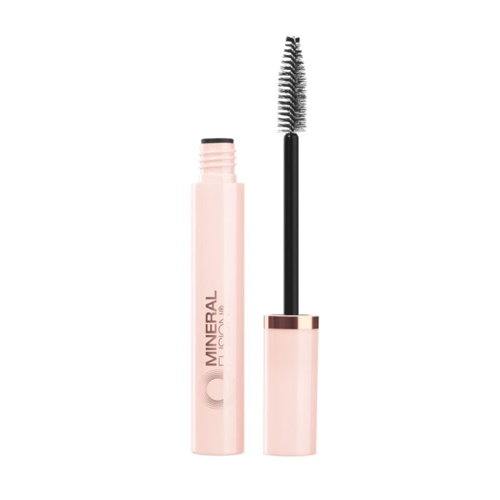 Cosmetics photography of a mascara brush and bottle placed next to each other on a white background.