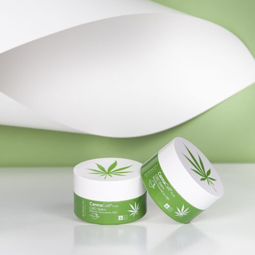 Cosmetic balm product shot on a green and white paper by Isa Aydin nj ny la