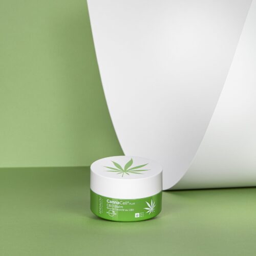 Cosmetic balm product shot on a green paper by Isa Aydin nj ny la