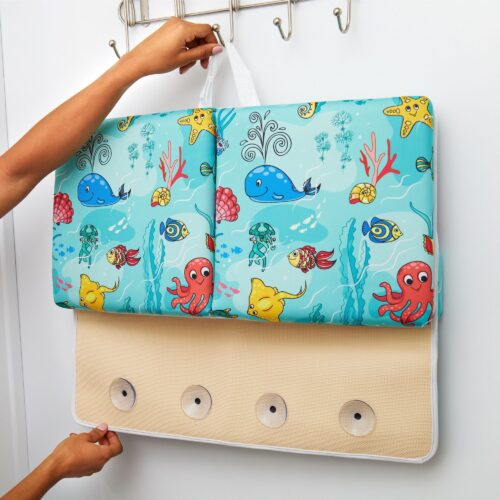 Baby and toddler bathing kit commercial product lifestyle photography with hand model