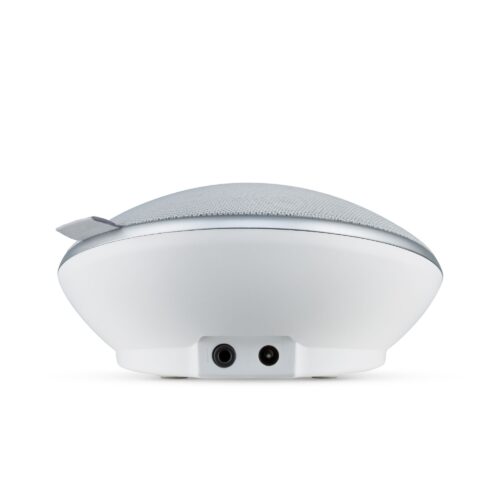 Product shot of a speaker from its back side showing it’s port with white background