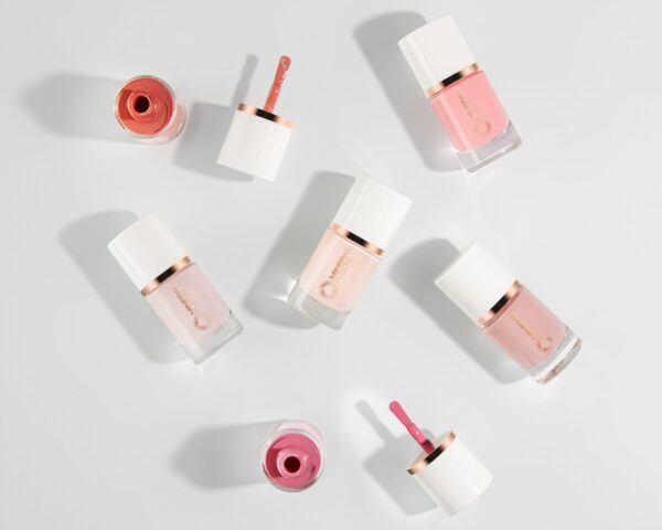 Nail color creative lifestyle commercial product photography on a white background