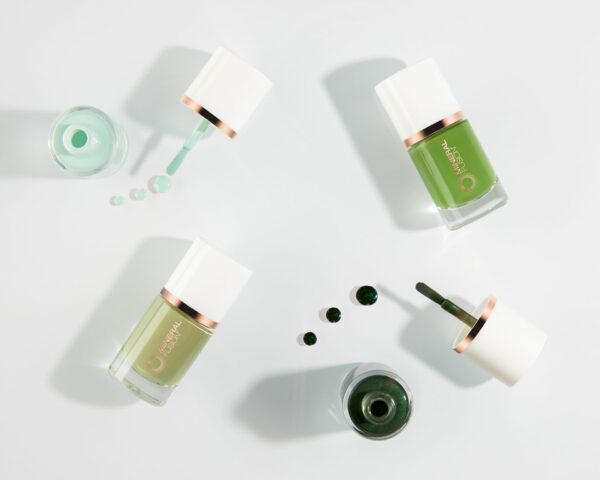 Nail color creative lifestyle commercial product photography on a white background