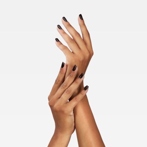 Professional commercial photoshoot with a female hand model on a white background