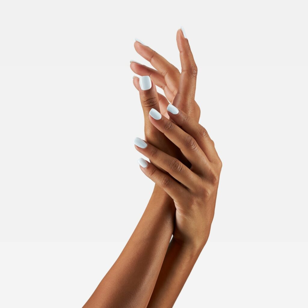 Professional commercial photoshoot with a female hand model on a white background by Isa Aydin NJ NY LA