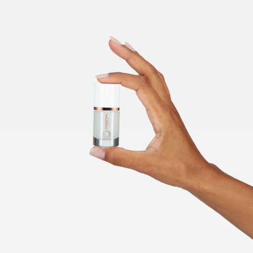 Commercial nail color product photoshoot on a white background with a model