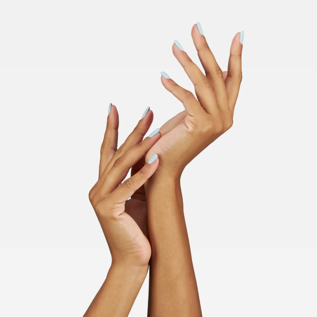 Professional commercial photoshoot with a female hand model on a white background by Isa Aydin NJ NY LA