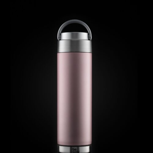 Pink color bottle product photoshoot on a balck background for ecommercia