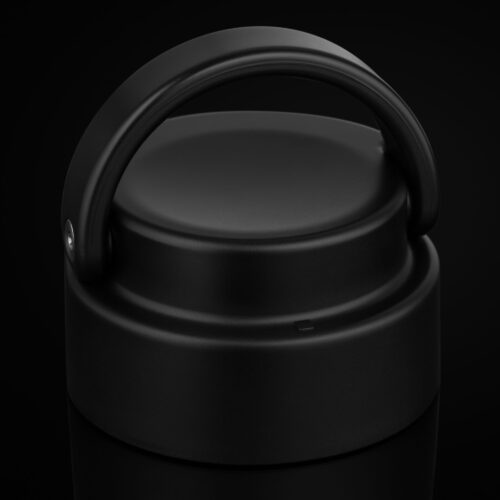 Black color bottle cap product photoshoot on a black background for ecommercia