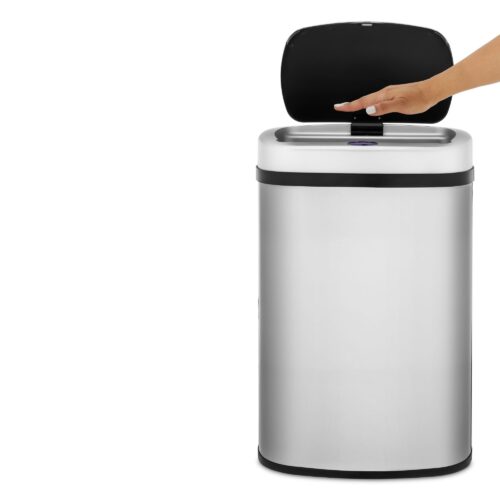 Action shot of a female hand model opening the lid of a highly reflective electric bin.