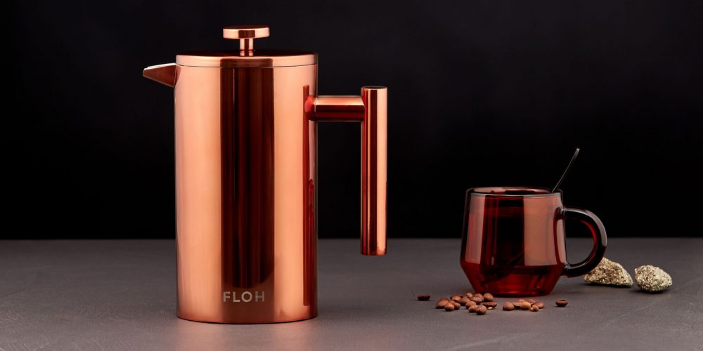 Golden color teapot product lifestyle photoshoot on a black background by Isa Aydin NJ NY LA