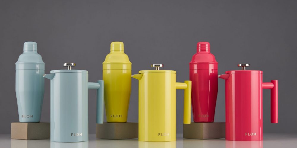 Cocktail shaker and teapot product lifestyle group photoshoot on a grey background