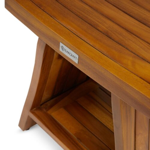 Close up shot of a wooden table by Teakcraft on a white background.
