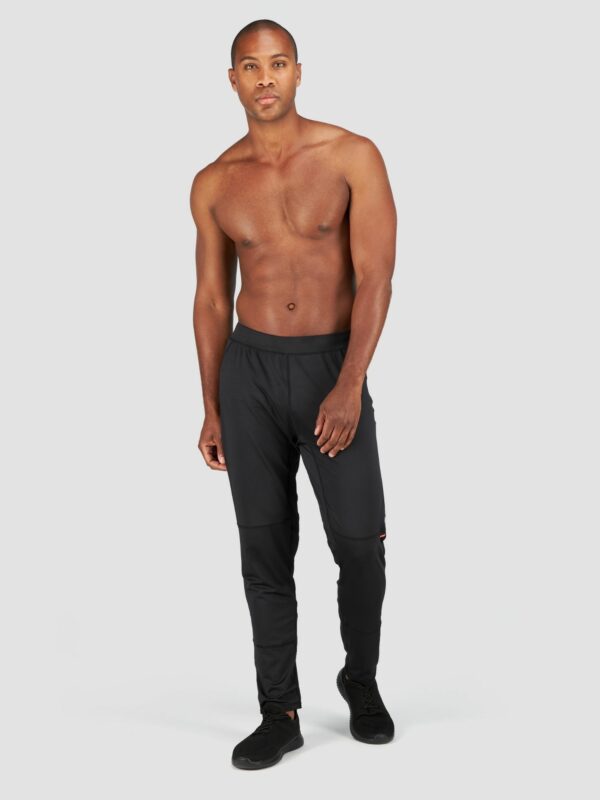 Product shot of a male model wearing sports pant in black