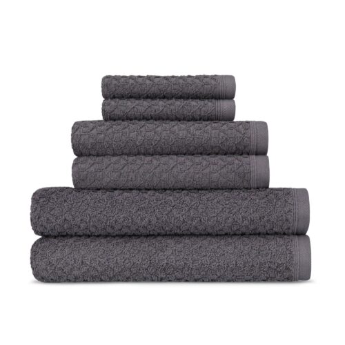 Hero shot of a stack of black colored towels on a white background.