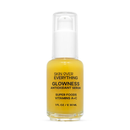 Cosmetics hero shot of an antioxidant serum in yellow color on a white background.