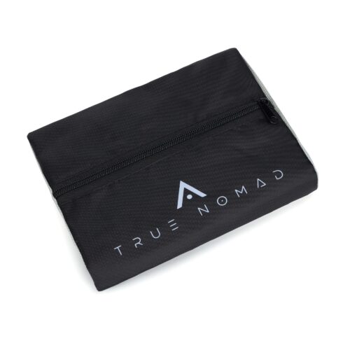 Hero shot of a black colored foldable travel bag by true nomad on a white background.
