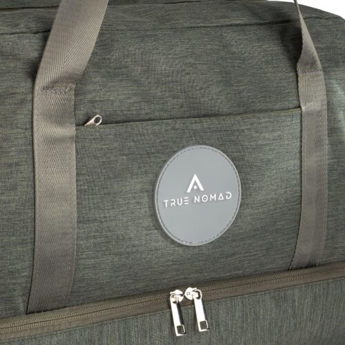 Close up shot of a voyager grey colored travel back showcasing the texture of the bag.