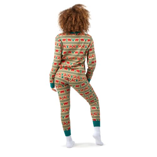 Back shot of a female model with curly hairs wearing brown and green colored pajama and shirt on a white background.