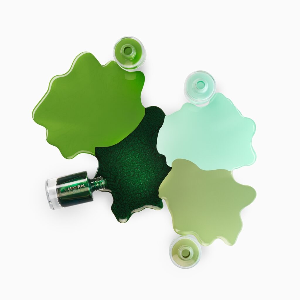 Creative nail polish photography of 4 nail polish bottles with different shades of green by Isa Aydin nj ny la