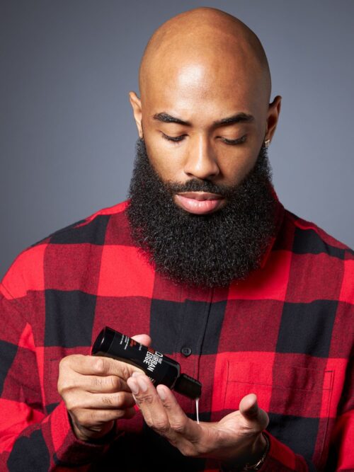 Commercial cosmetic product photoshoot with black male model by Isa Aydin nj ny la
