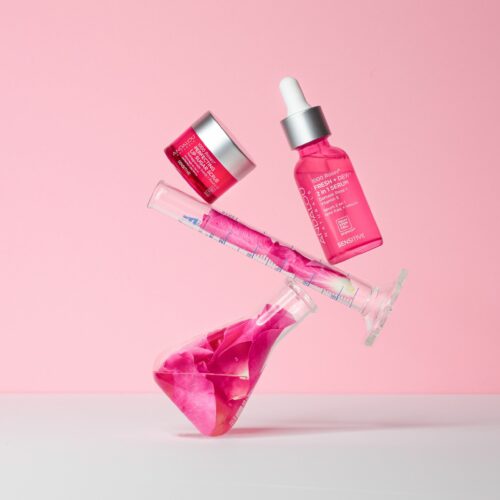 Creative skincare shoot on a pink background for social media content