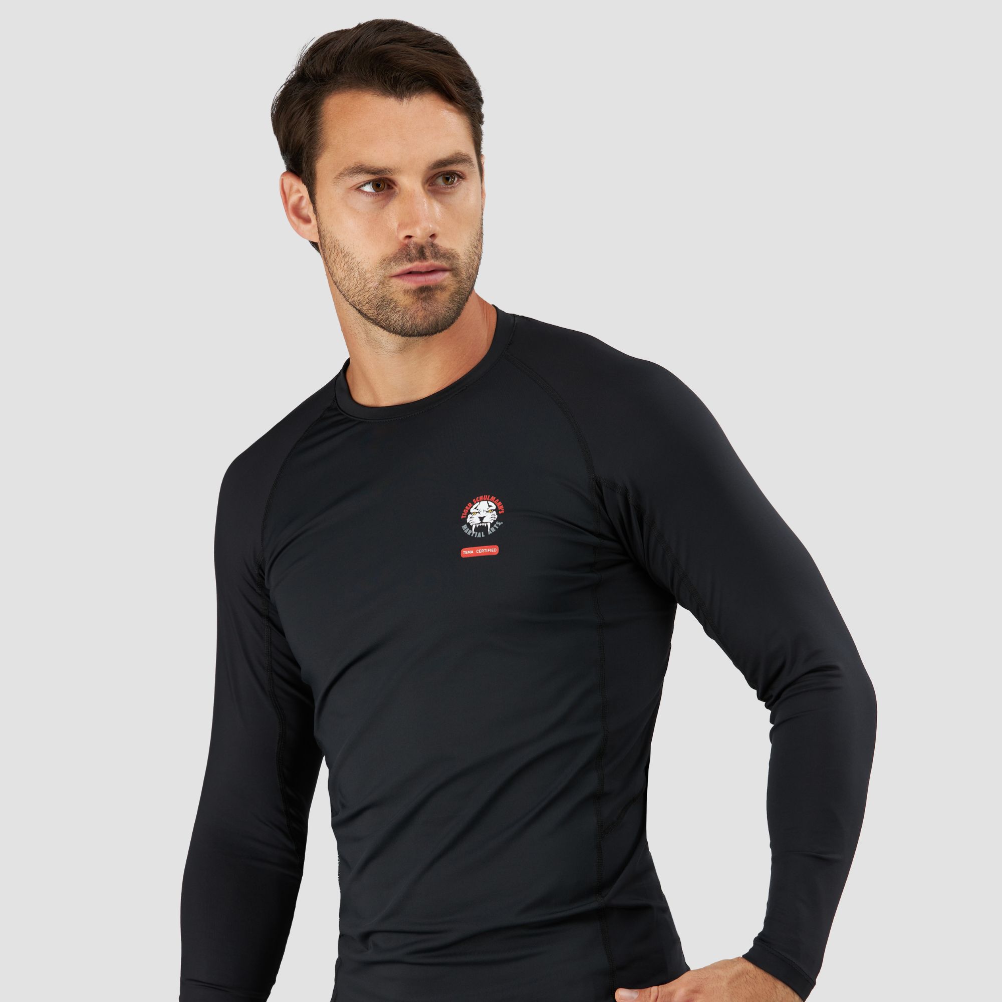 T shirt clothing photoshoot with male model on a white background