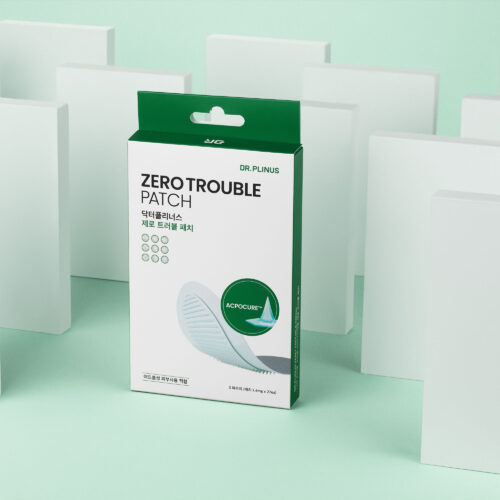 Creative skincare photography for facial patch box on a green background