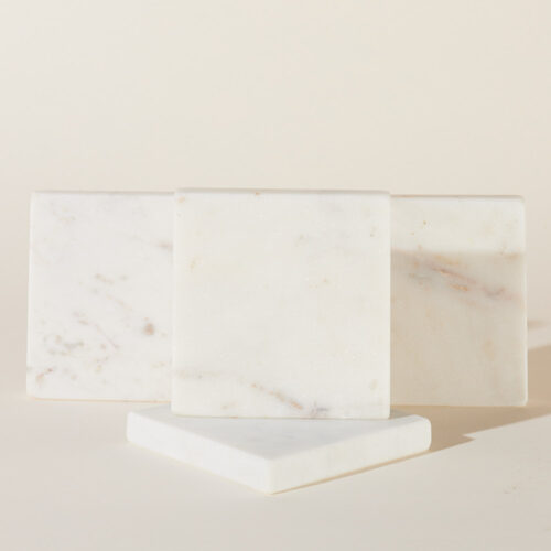 Props marble pieces photoshoot on a beige background by Isa Aydin nj ny la