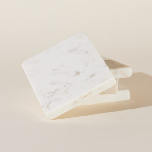 Props marble pieces photoshoot on a beige background by Isa Aydin nj ny la