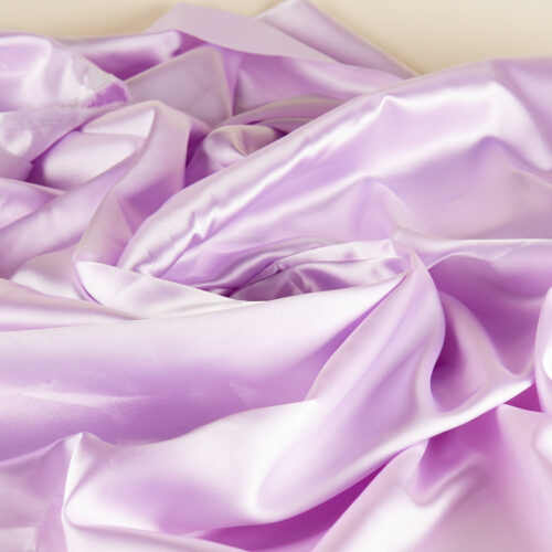 Pink color creative material props on a lay-flat angle by Isa Aydin nj ny la
