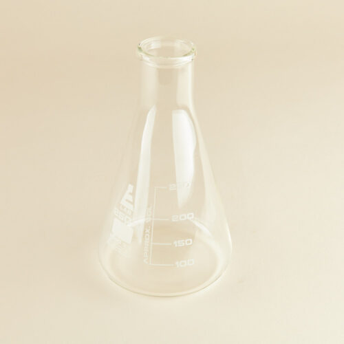 Lab glass baker prop photoshoot on a beige background by Isa Aydin nj ny la