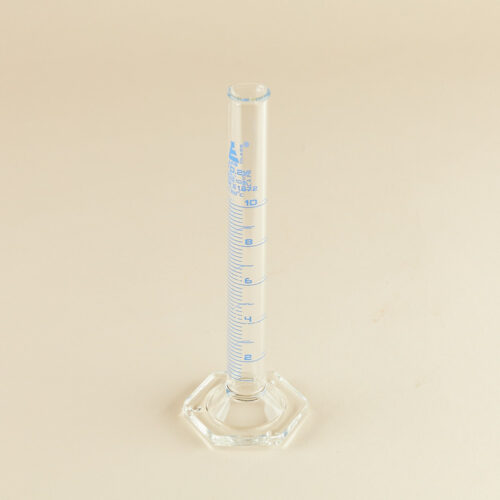 Lab glass baker prop photoshoot on a beige background by Isa Aydin nj ny la
