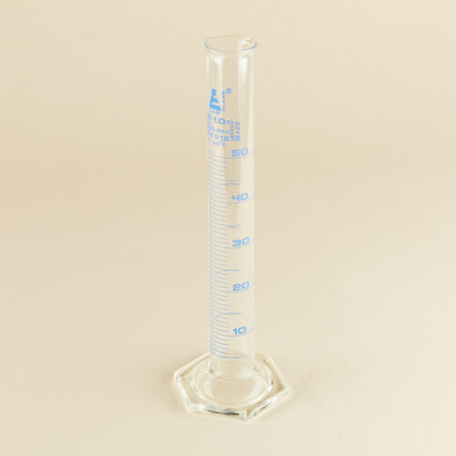 Lab glass baker prop photoshoot on a beige background by Isa Aydin nj ny la