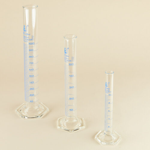 Lab glassware props set on a beige background by Isa Aydin nj ny la