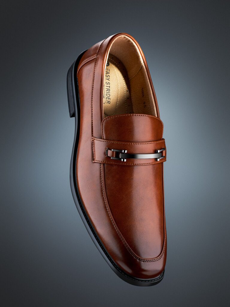 Shoes commercial photography, tan leather shoes on a gray background